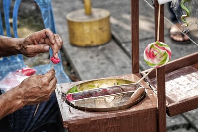 High angle view of man preparing food