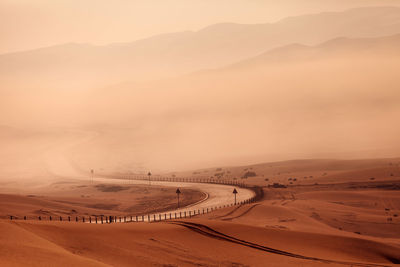 Scenic view of desert against sky