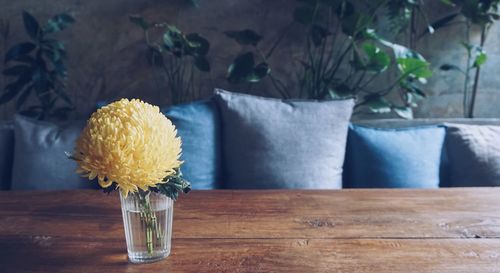Close-up of vase on table at home