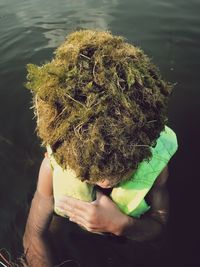 Close-up portrait of woman in water