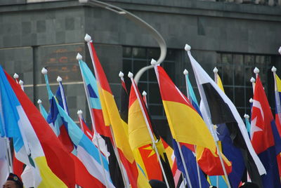 Low angle view of flags against building