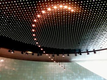 Low angle view of illuminated ceiling