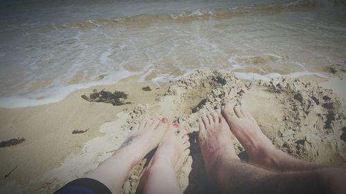 Low section of woman on beach