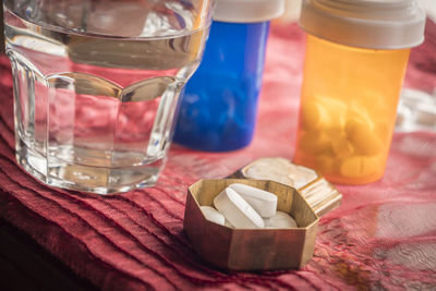 Close-up of drink in glass jar on table