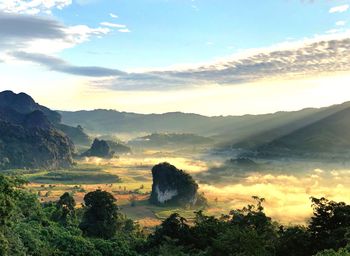 Scenic view of landscape against sky during sunset