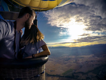 Couple in hot air balloon