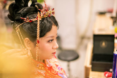 Close-up of bride looking away during wedding ceremony