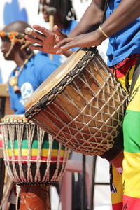 Close-up of hands playing drums