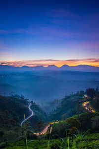 Scenic view of landscape against sky during sunset