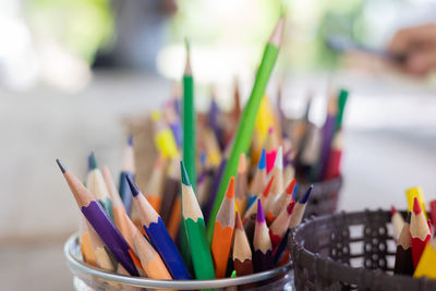 Close-up of colored pencils on table
