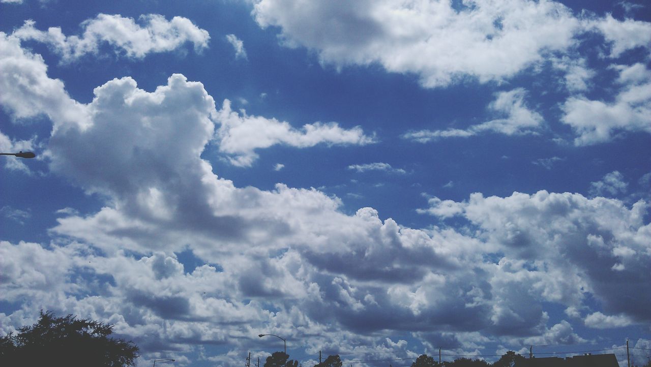 sky, cloud - sky, cloudy, low angle view, beauty in nature, scenics, tranquility, tranquil scene, cloud, nature, cloudscape, weather, white color, blue, idyllic, day, outdoors, no people, sky only, backgrounds