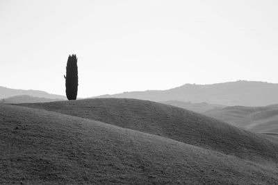 Scenic view of arid landscape against clear sky