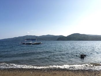 Scenic view of calm sea against sky