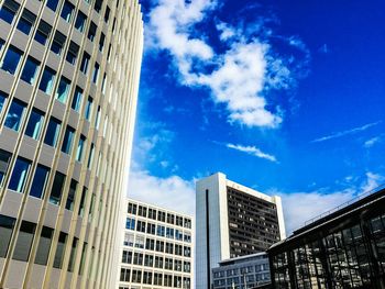 Low angle view of building against blue sky