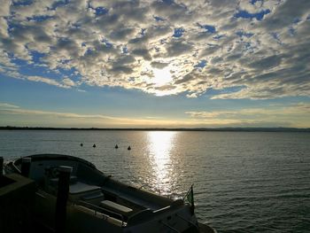 Scenic view of sea against sky at sunset