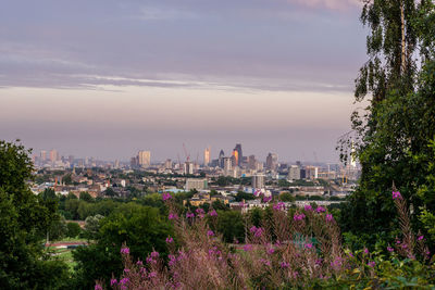 Cityscape against sky during sunset