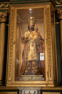 Low angle view of statue against building