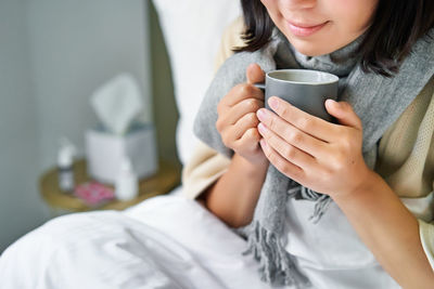 Young woman using mobile phone