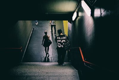 Man walking on staircase