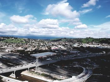 High angle view of city street against sky