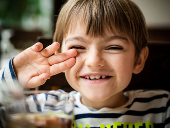 Close-up portrait of boy smiling