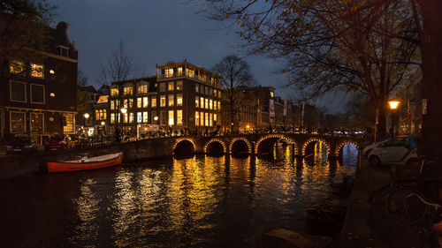 Illuminated buildings in city at night