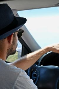 Portrait of man in car