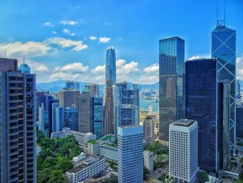 Modern buildings in city against sky