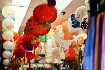 Low angle view of lanterns hanging in row