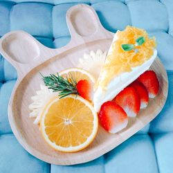 High angle view of fruits in plate on table