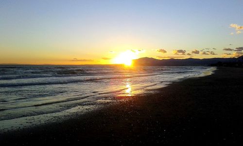 Scenic view of sea against sky during sunset