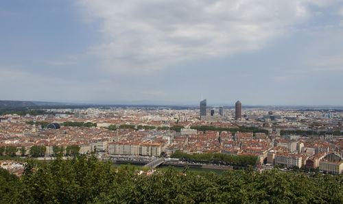 High angle view of buildings against sky
