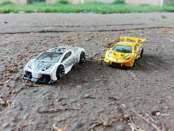 Yellow car on ground