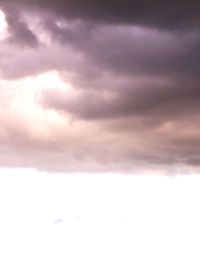 Low angle view of cloudy sky during sunset