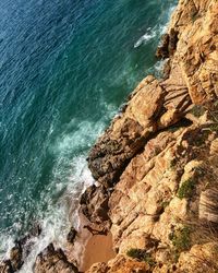 High angle view of rocks on beach