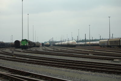 Train on railroad track against sky