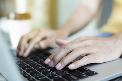 Close-up of person using mobile phone