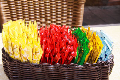 High angle view of multi colored candies in basket