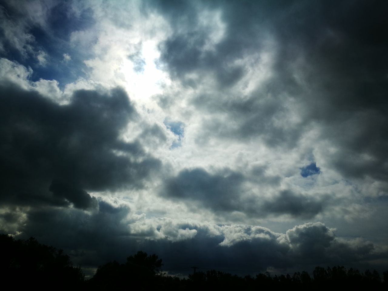 cloud - sky, sky, low angle view, nature, beauty in nature, no people, tranquility, outdoors, tranquil scene, day, scenics, silhouette, sky only, blue, tree