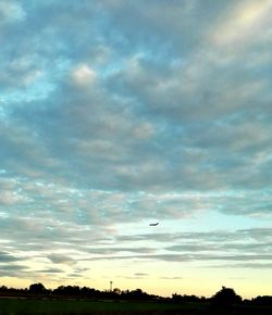 Scenic view of dramatic sky over landscape