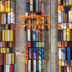 Aerial view of shipping container port terminal. colourful pattern of containers in harbor. maritime