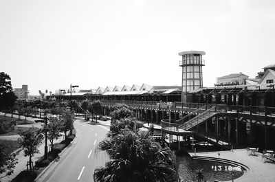 Cars on road against clear sky