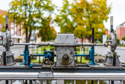 Close-up of pipes against blue sky