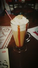 Close-up of cappuccino on table