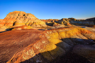 Scenic view of rocky mountains against clear sky