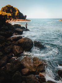 Scenic view of sea against clear sky