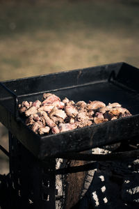 High angle view of meat on barbecue grill