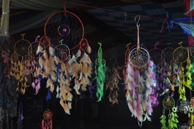 Low angle view of multi colored decoration hanging for dasale at market