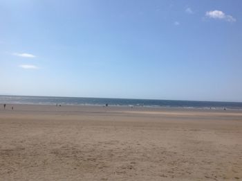 Scenic view of beach against clear sky