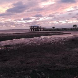 Scenic view of sea against sky at sunset